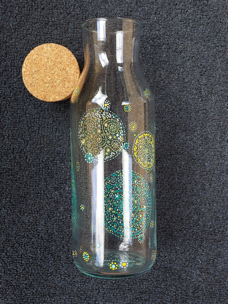 PURPOSE - Glass water bottel 1 ltr, handpainted dots Light Language Codes teal blue, yellow, white