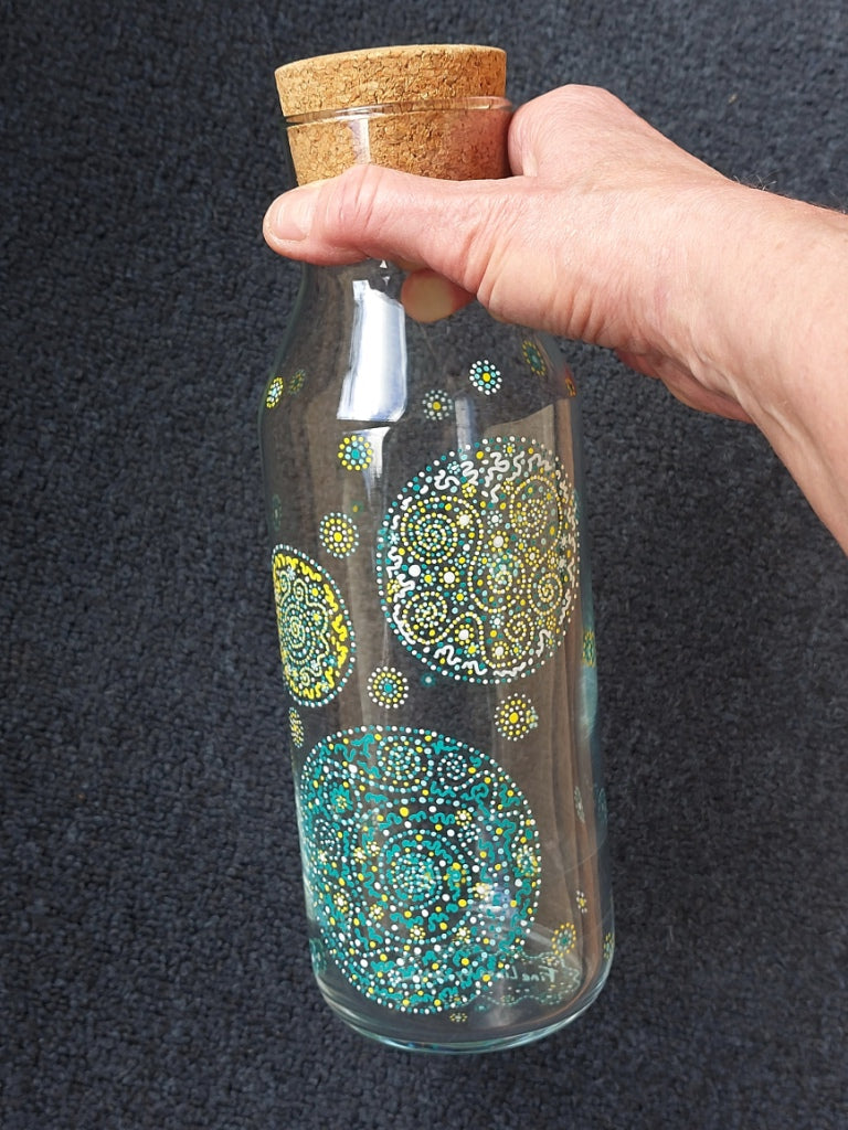PURPOSE - Glass water bottel 1 ltr, handpainted dots Light Language Codes teal blue, yellow, white